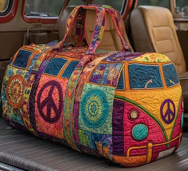 Erlene | Quilted Weekend Bag — quilted duffle bag with a retro camper van design, patchwork of pink, teal, orange and purple blocks with peace signs and mandalas