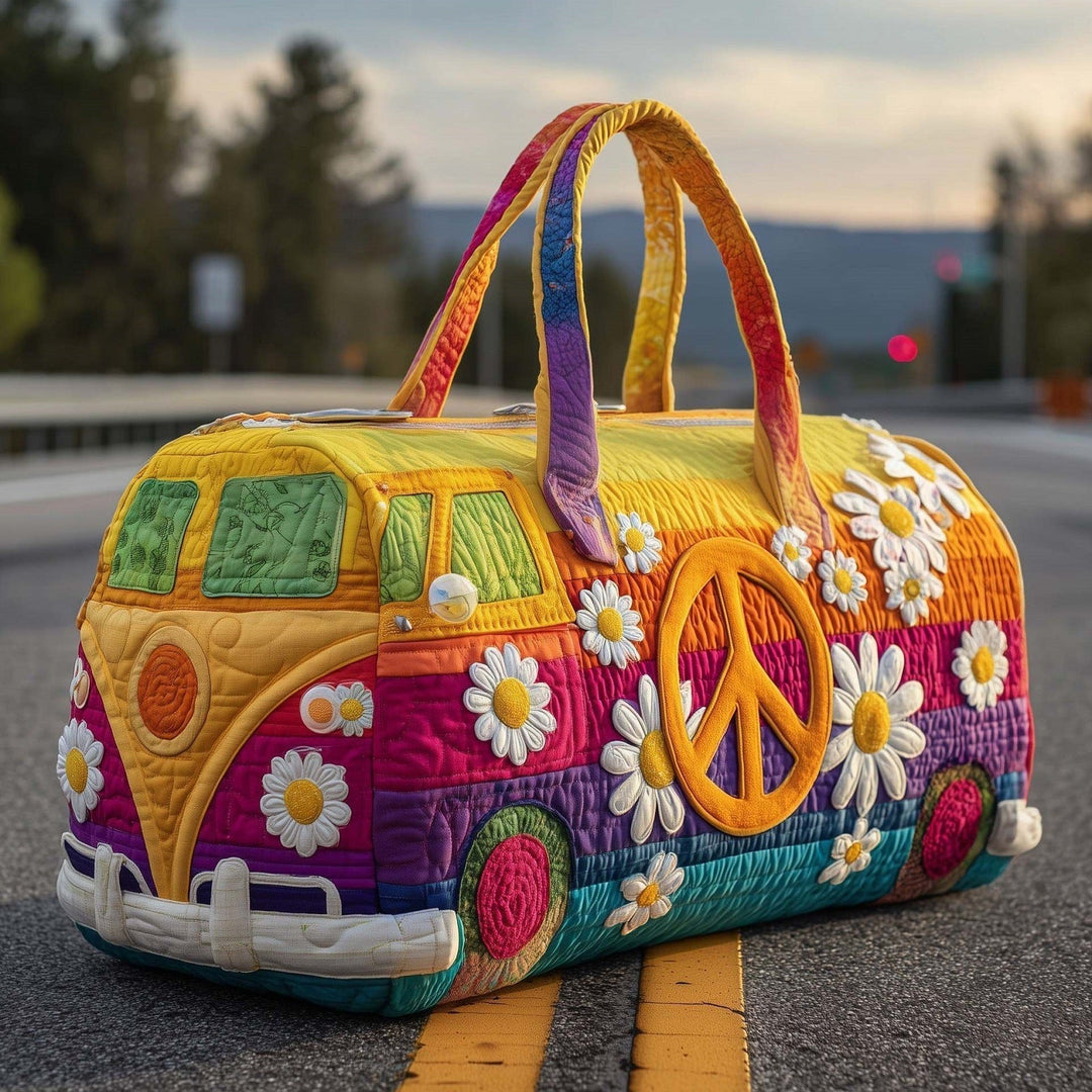 Zelphia | Quilted Weekend Bag — quilted duffle bag with a retro camper van design, yellow and magenta body with a large yellow peace sign and white daisies