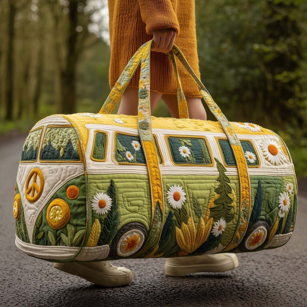 Velma | Quilted Weekend Bag — quilted duffle bag with a retro camper van design, golden yellow body with a green meadow and white daisies