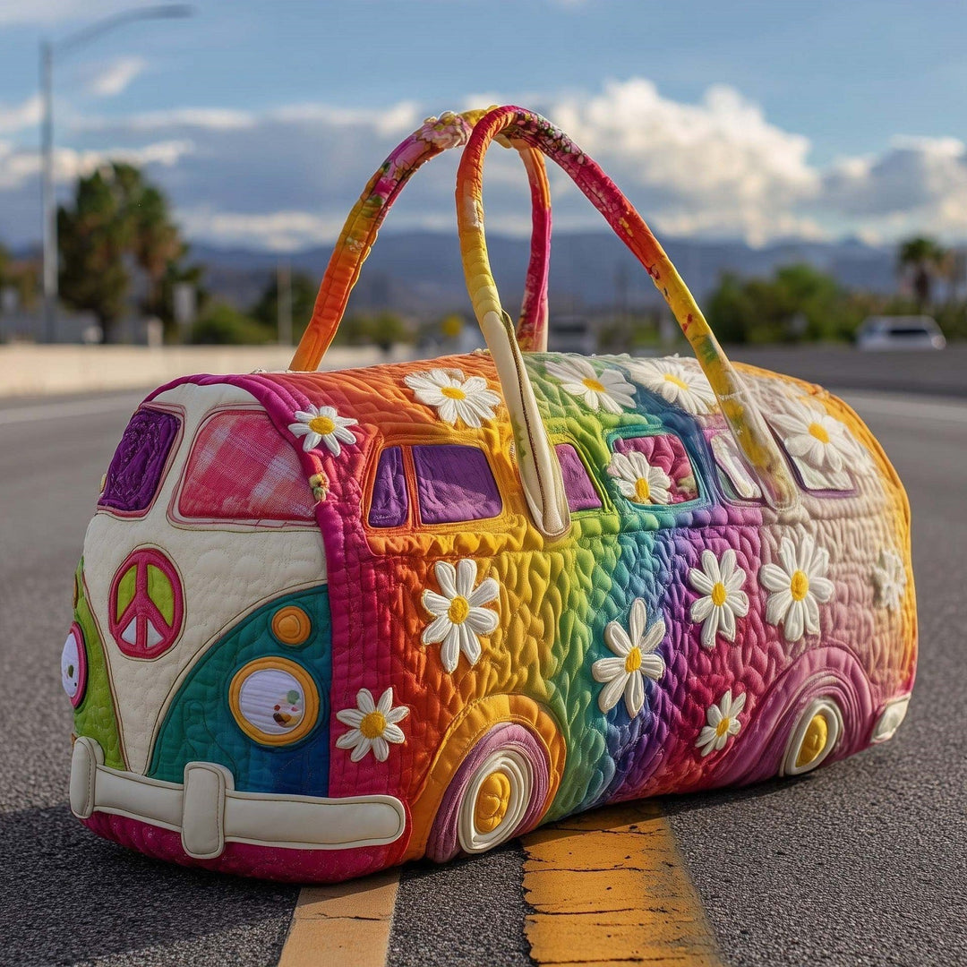 Vernita | Quilted Weekend Bag — quilted duffle bag with a retro camper van design, magenta and teal panels with yellow trim and white daisies